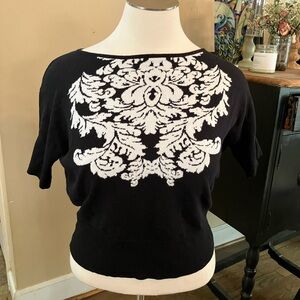 NYC black and white print half sleeve sweater
Size xl
Great condition